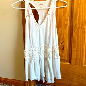 Woman’s white tank